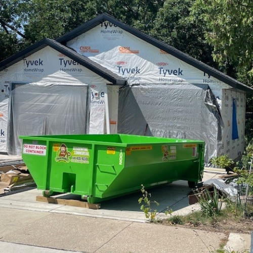 Affordable Dumpster Rental place in driveway