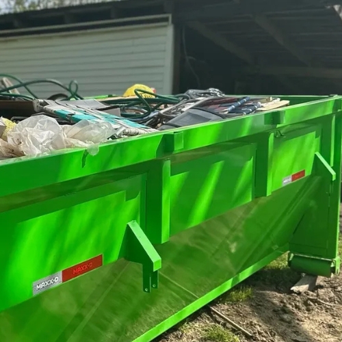 Green Dumpster Filled Up All the Way